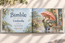 Illustrative Storybook Blue book spread: Bimble means Umbrella, with a watercolor otter on a rainy walk.
